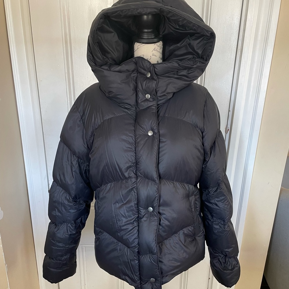 Beautiful Cotopaxi warm down puffer. Like new. Flatering with a big cozy hood.
